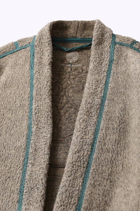 Jacket in faux fur with embroidery on the back